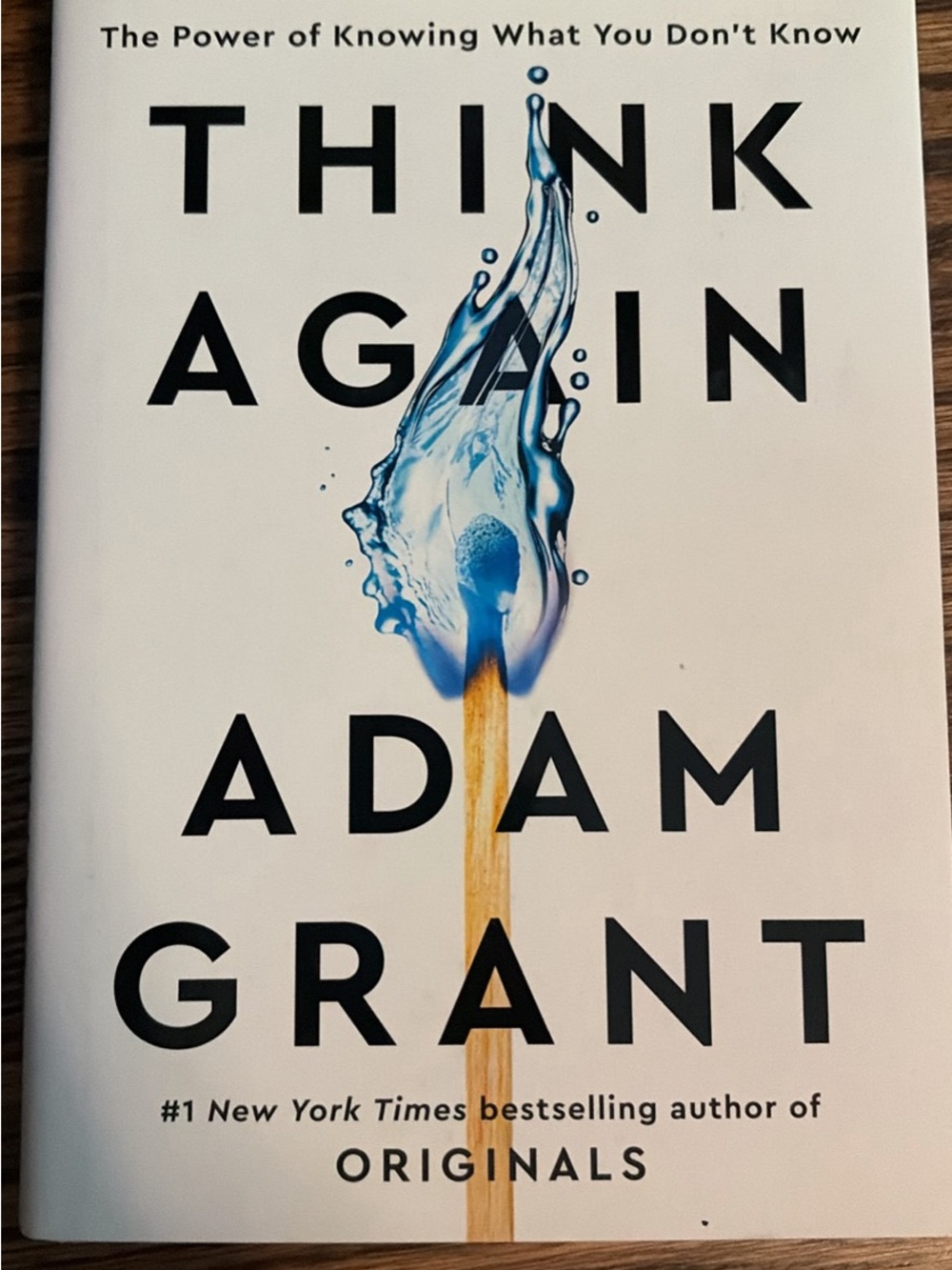 Think Again by Adam Grant — White Cover with Blue Match Illustration